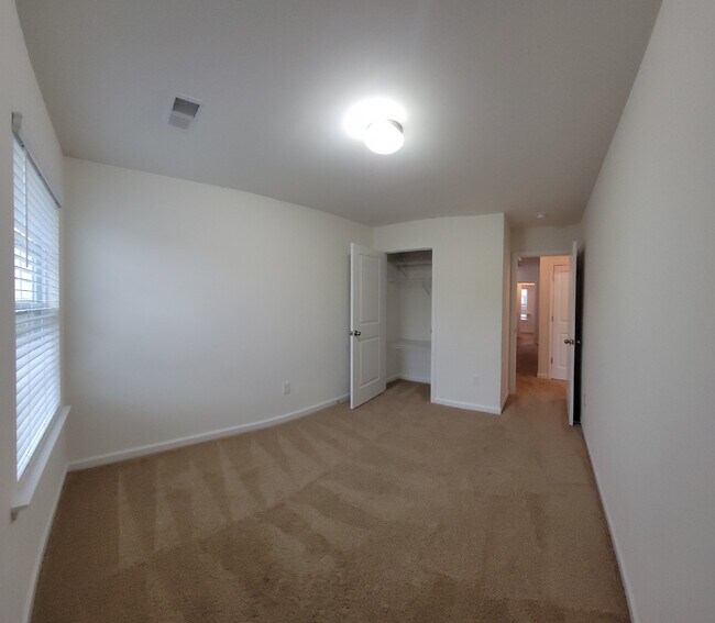 Building Photo - "Modern 3-Bedroom Multiplex with 3 Full Ba...