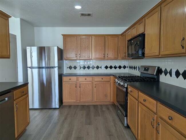 Building Photo - 5618 Savannah Woods Ln