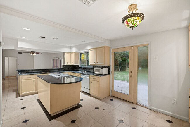 Building Photo - Charming Home with Expansive Backyard on a...