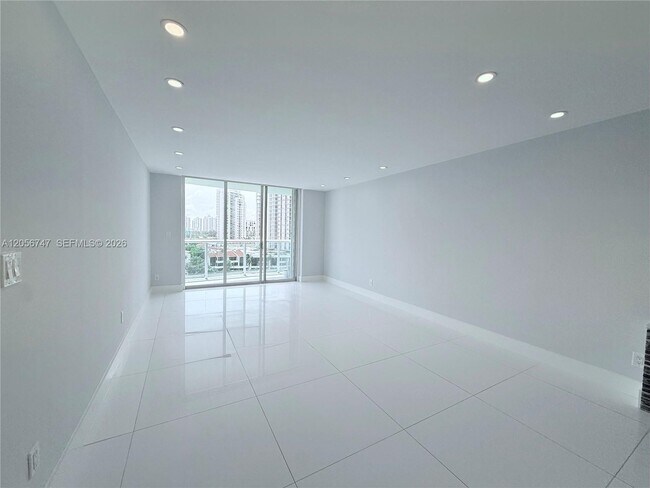 Building Photo - 19390 Collins Ave