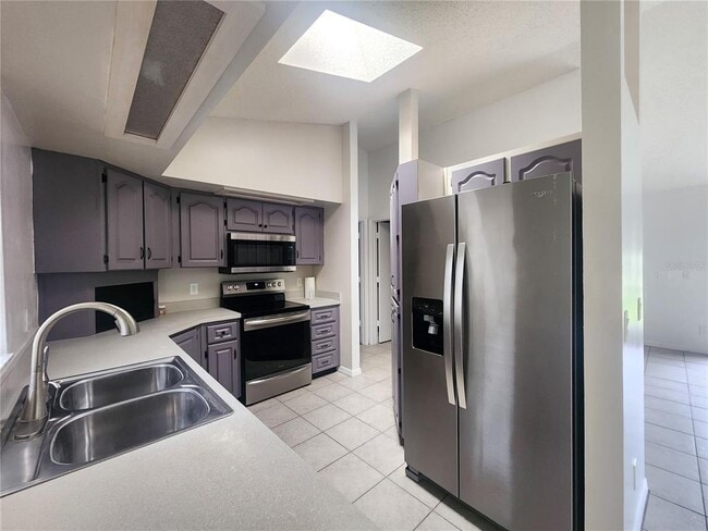 Building Photo - 9392 N Sandree Dr