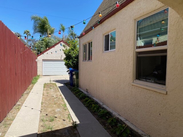 driveway parking for 3 more cars - 1344 S Curson Ave