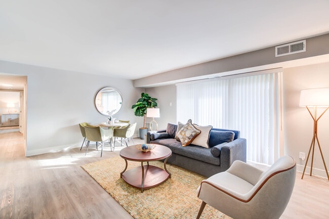 Spacious Newly Renovated Living Areas With Wood-Style Flooring - Creekside Village I