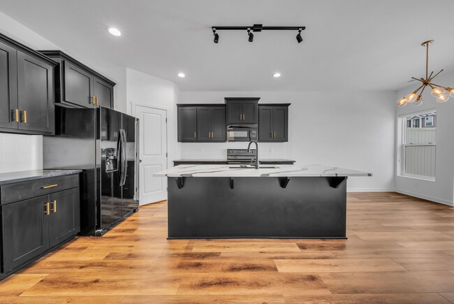 Building Photo - Modern Duplex with Spacious Design & Upsca...