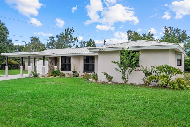 Building Photo - 3-Bedroom Punta Gorda Retreat with Marble Finishes & Stylish Furnishings!"