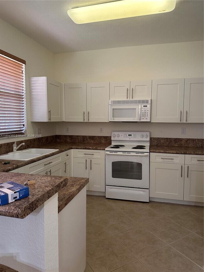 Building Photo - 12852 SW 133rd Terrace