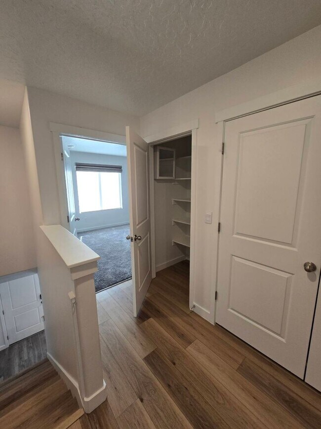 Building Photo - Nearly New, Well Appointed Modern Townhouse w 2 car attached garage