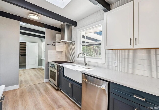 Building Photo - Quiet, Tree-Shaded Mid-Mod Steps to Downtown Littleton. Gorgeous Remodel.