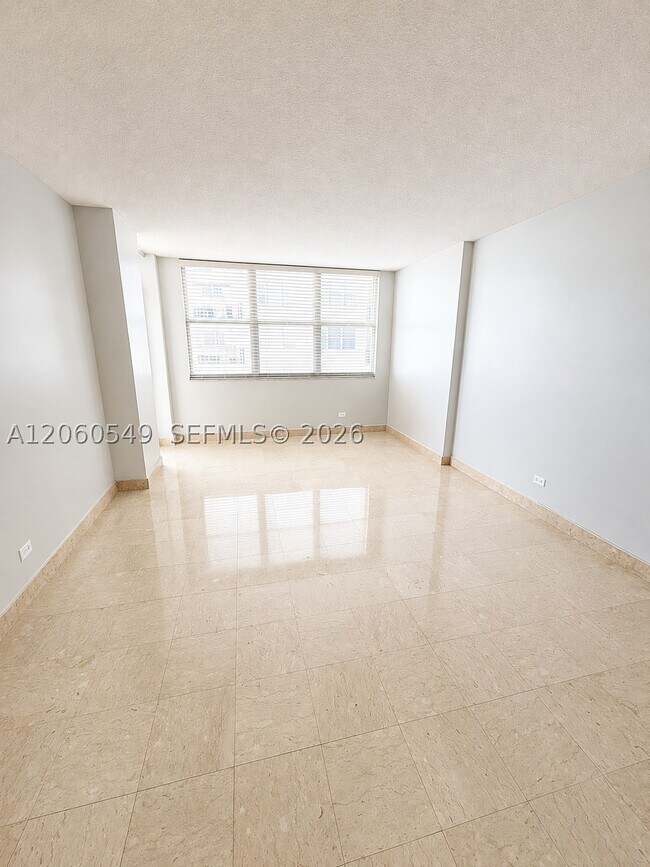 Building Photo - 6039 Collins Ave