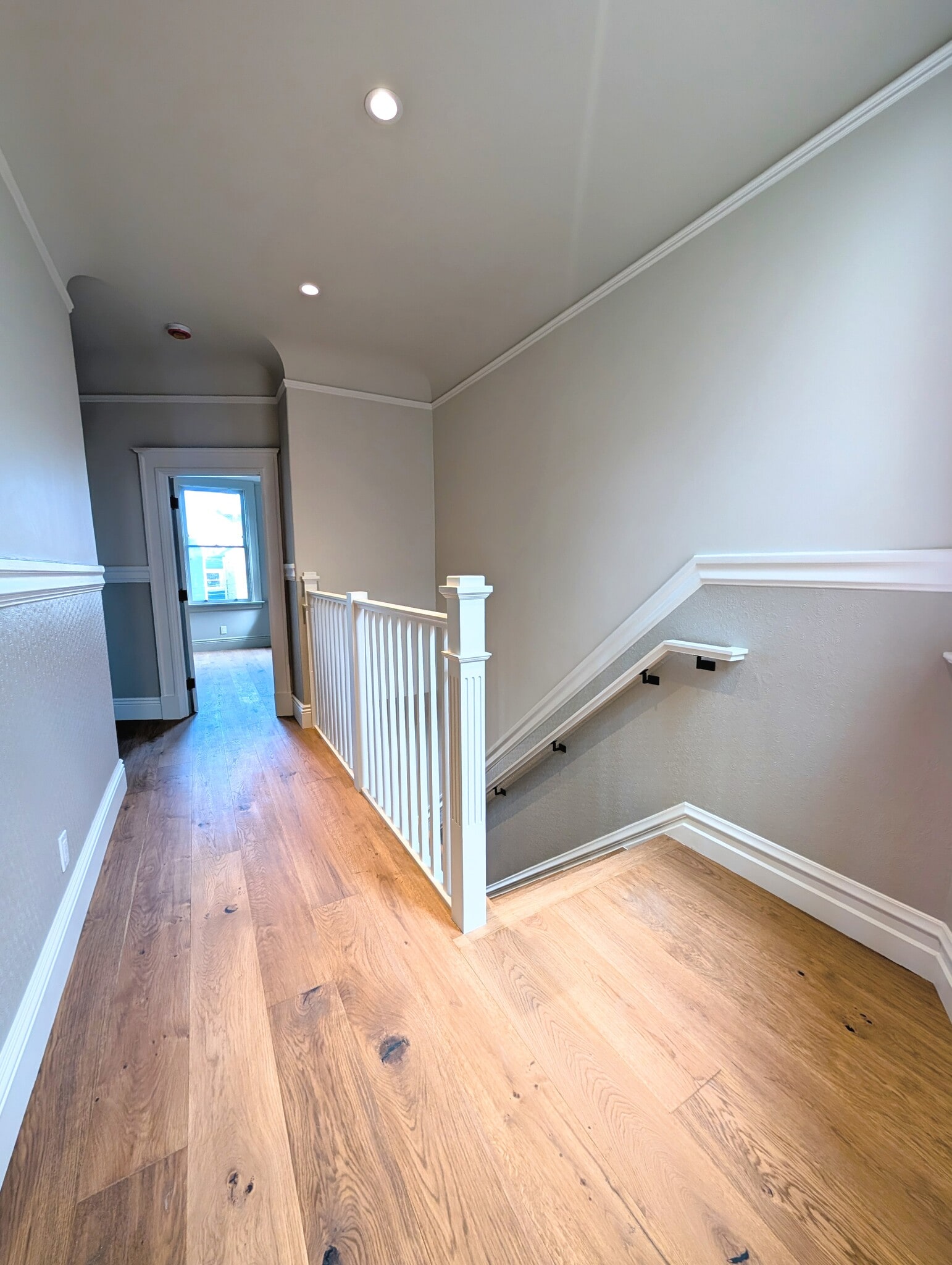 Entry area. The entire home features dim-to-warm lighting for daylight or fireside amber on demand. - 328 Lexington St