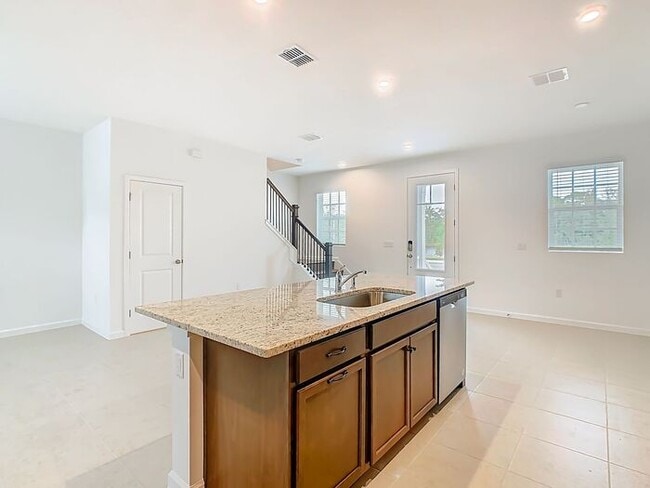Building Photo - New Luxury Townhome in Celebration, FL Corner unit. All porcelain tiled floors. Aleutian model by...