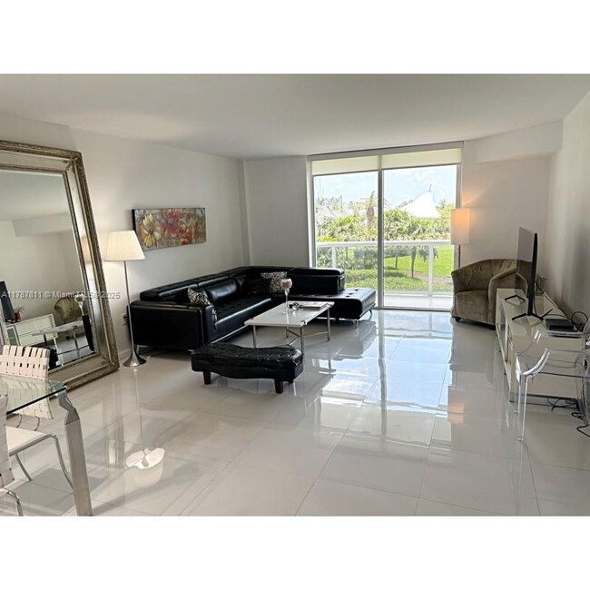 Building Photo - 10275 Collins Ave