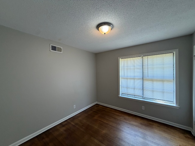 Building Photo - Charming 3BR/1.5BA Bartlett Area Home | Brick Fireplace, Tile Kitchen & Fenced Yard