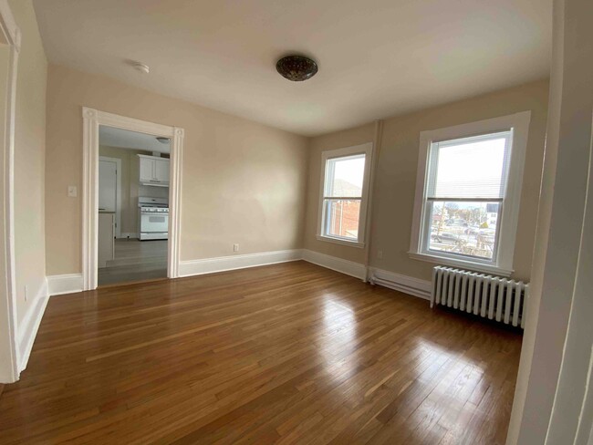 Center Room B Looking towards Kitchen - 483 Charles St