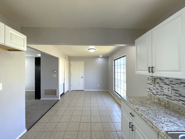 Building Photo - Welcome to this charming two-story single-...