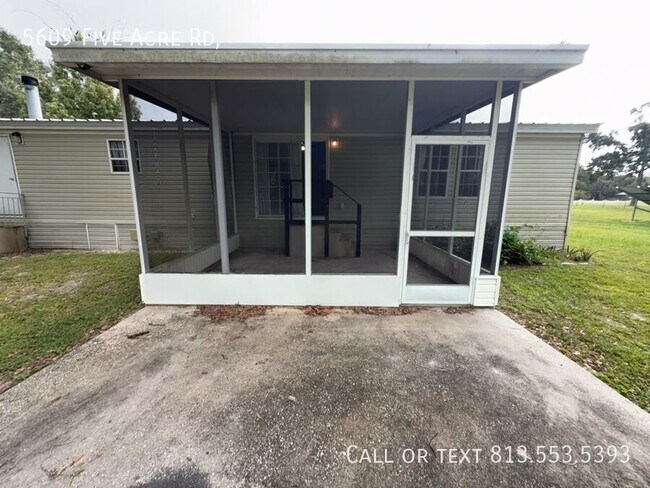Building Photo - 5609 Five Acre Rd
