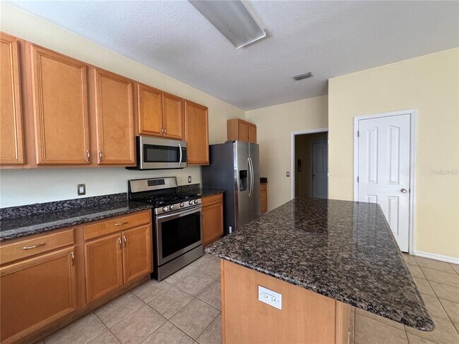Building Photo - 6767 Waterton Dr