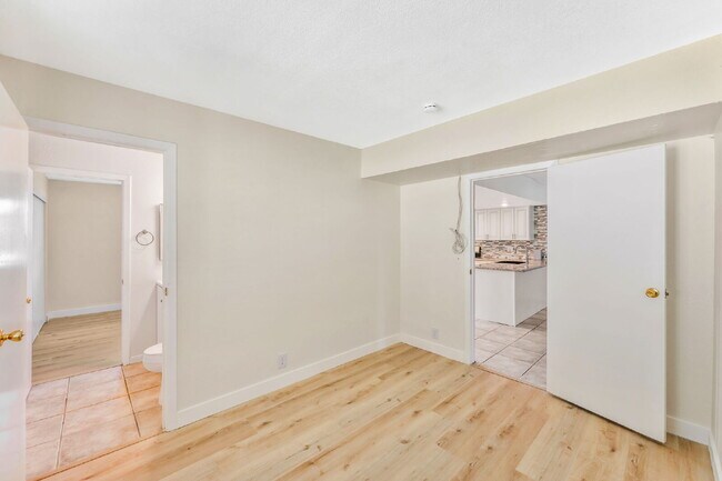 Building Photo - FULLY REMODELED UPSTAIRS CONDO | 3 BEDROOM | GRANITE COUNTERS | LAKE MEAD & JONES