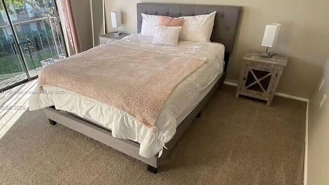 Building Photo - 6060 Village Cir N