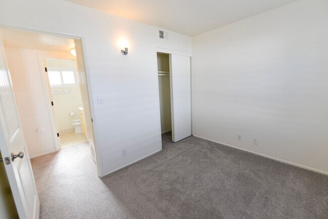 Building Photo - Sunny 2BR/2BA Coastal Retreat — Steps from the Sand with Ocean Breezes