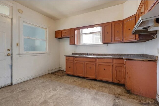 Building Photo - 1301 W 71st Pl