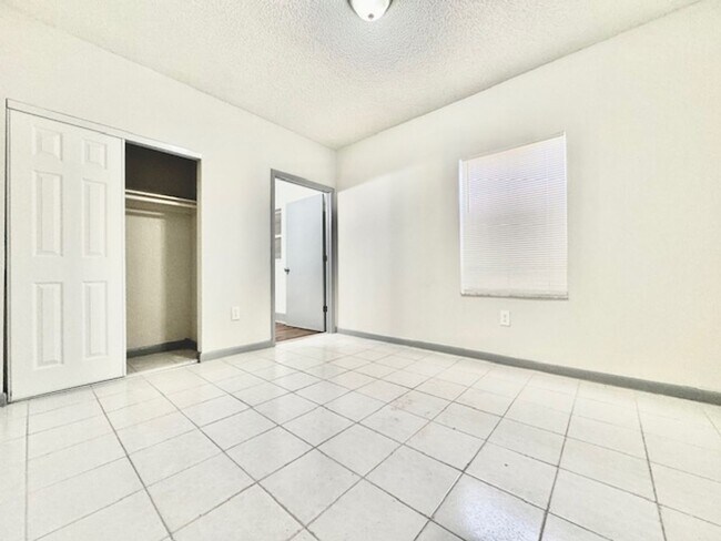Building Photo - Three Bedroom Single Family Home with Private Fenced Yard