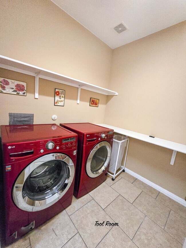 Laundy room comes with these like new beautiful washer/dryer w/ plenty of space to fold clothes. - 301 Silver Trl