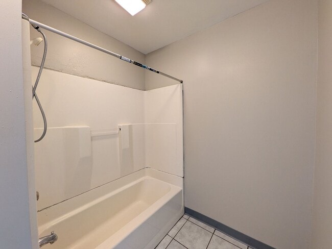 Building Photo - Large 4 Bedroom Home with Garage, Deck, & Fence!