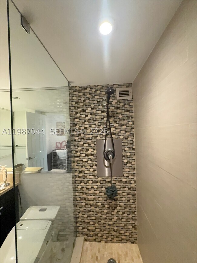 Building Photo - 5555 Collins Ave