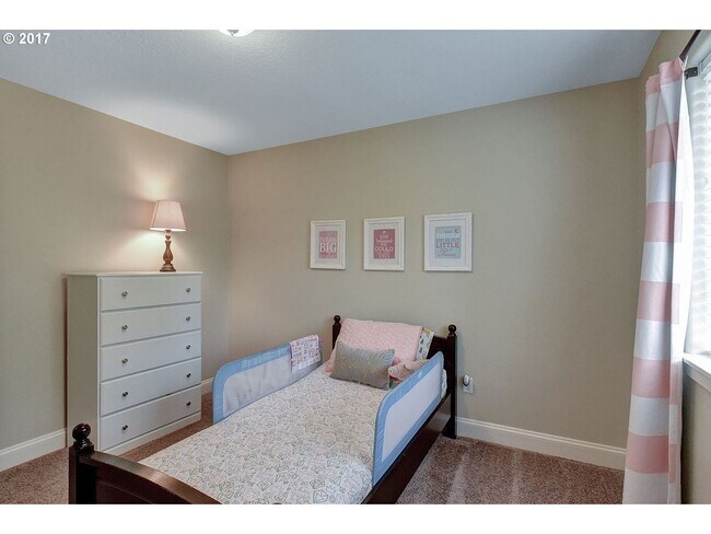 Building Photo - Bright and Open Floor Plan with Fireplace, Attached Garage & Vaulted Ceilings