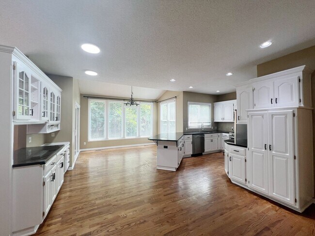 Building Photo - COMING SOON: Spacious 4-Bed Home with Fini...