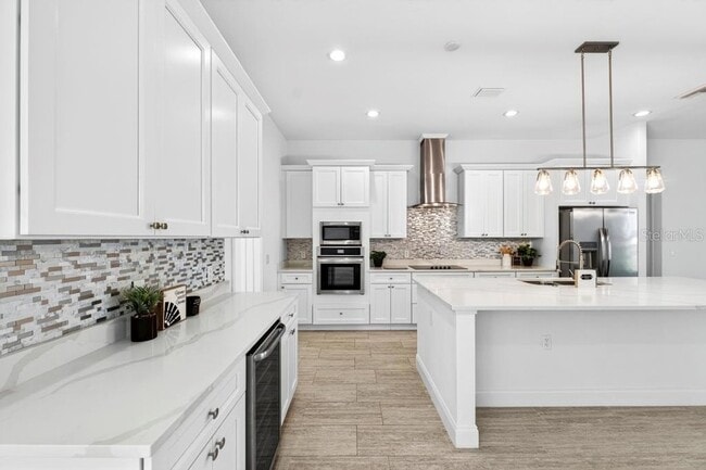 Building Photo - 200 Snowy Orchid Way