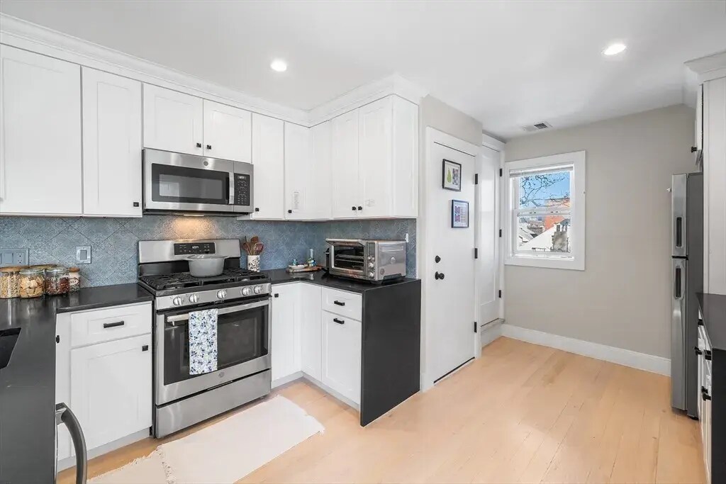 Ample Counter Space and Soft Close Cabinet Storage - 102A Mount Pleasant Ave