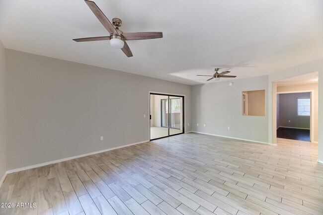 Building Photo - 9555 E Raintree Dr