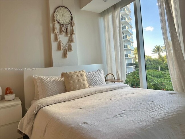 Building Photo - 10275 Collins Ave