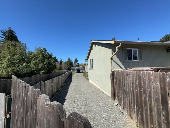 Building Photo - Newley updated 3-bedroom home features fenced yard, garage, and covered patios!