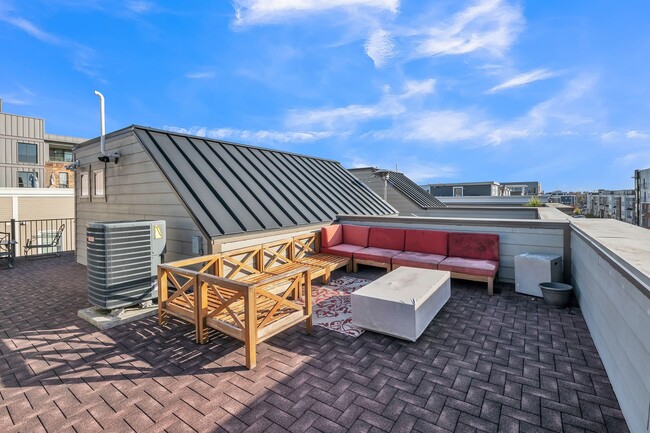 Building Photo - Modern Townhome with Rooftop Views, Gourme...