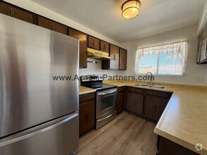 Building Photo - Three Bedroom Multi Level Home