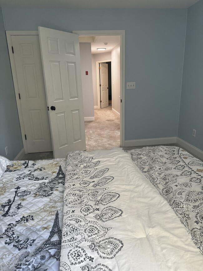 Bedroom 2 showing upstairs hallway - 6301 Scottsfield Dr