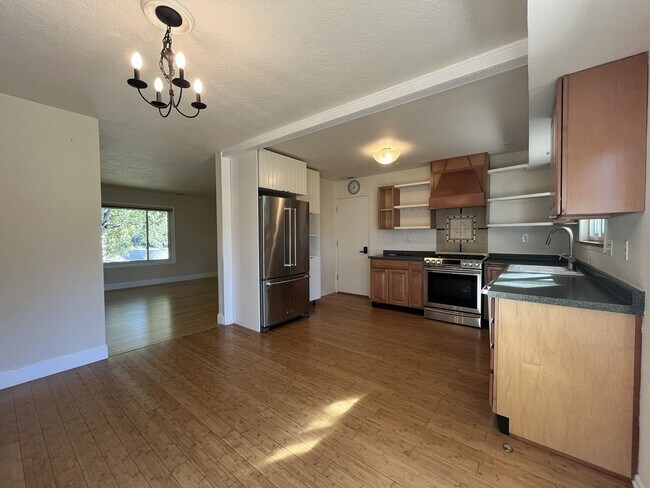 Building Photo - Light-Filled Home with Open Layout, Modern...