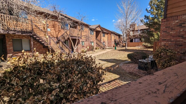 Building Photo - NICE 2-BDRM CONDO WITH FIREPLACE, CARPORT,...