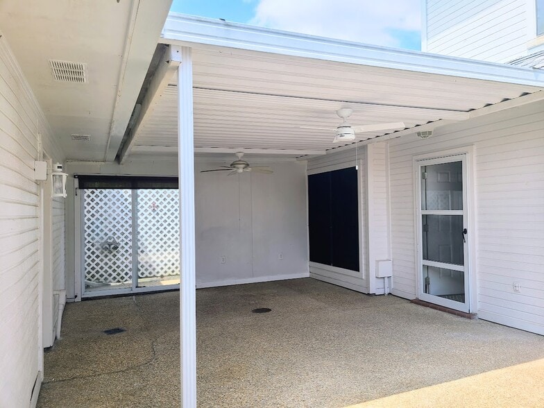 Private Patio is extra large for relaxing, outdoor dining and grilling - 12439 Coursey Blvd