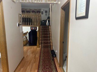 Hallway to Upper Living Room - 19158 Yale St NW