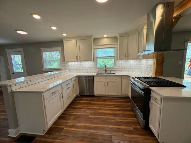 Building Photo - Exquisite Brick Ranch with Modern Upgrades, Countryside Charm And Two Car Garage