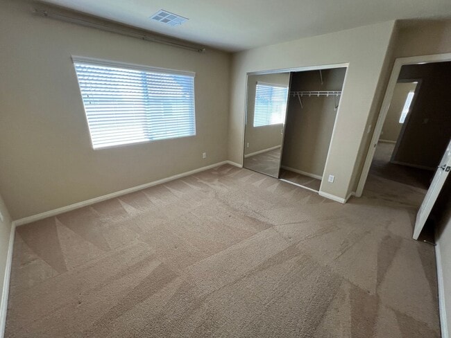 Building Photo - A Fantastic 4 Bedroom Home with the primary Downstairs, in Silverado Ranch
