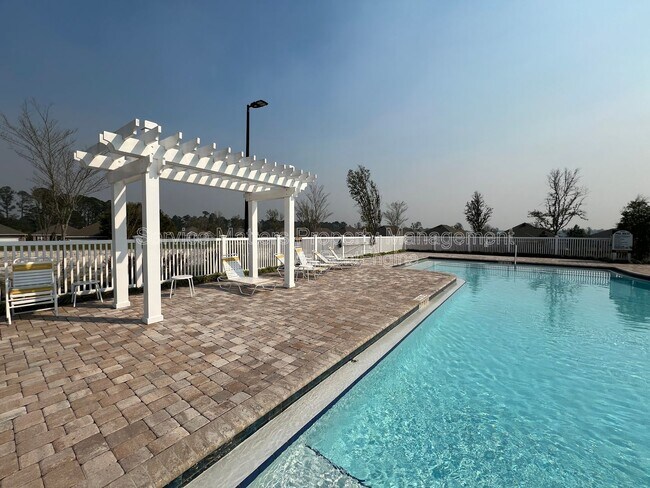 Building Photo - 4130 Lazy Breeze Ln