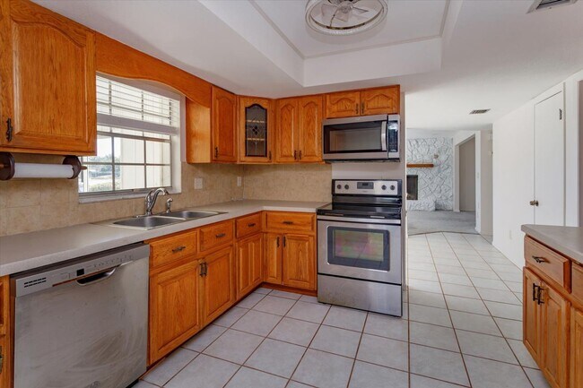 Building Photo - Updated 4-Bedroom Longwood Rental with Pool & Lawn Care Included – Move-In Ready