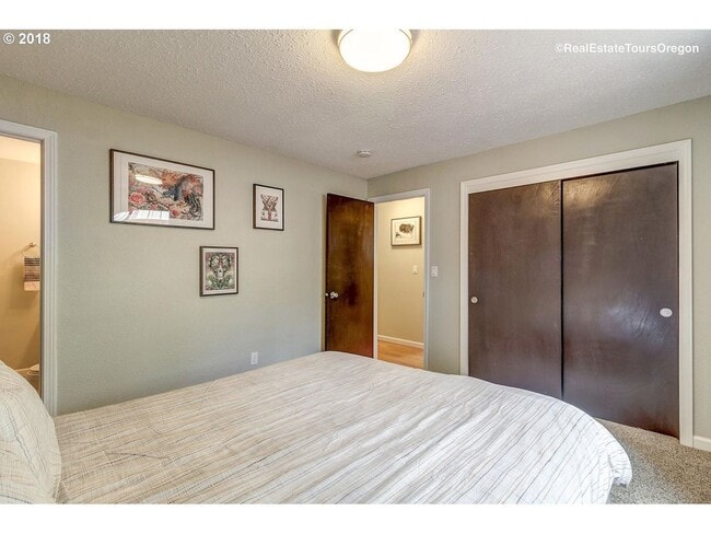 Building Photo - Spacious 4-Bedroom Home with Multiple Livi...