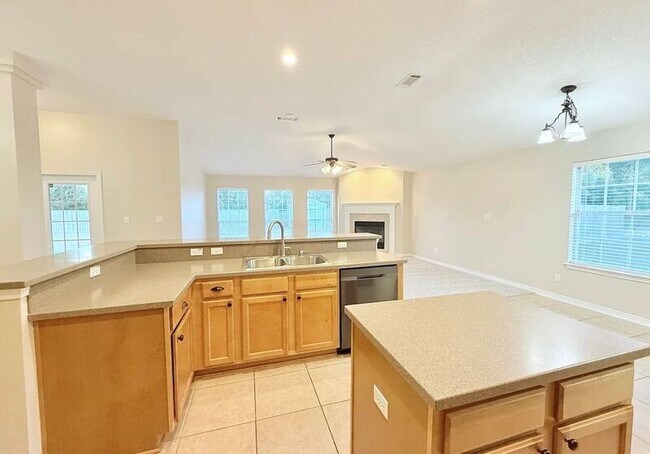 Building Photo - 5659 Tiger Woods Dr