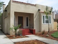 Building Photo - This Charming Spanish style home is locate...